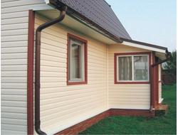Дом с наружной отделкой сайдингом