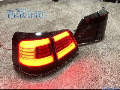 Cтопы Toyota Land Cruiser 200 07-15 LED темные БЕГАЮЩИЕ