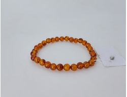 Браслет шары из коньячного янтаря