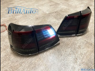 Cтопы Toyota Land Cruiser 200 07-15 LED темные БЕГАЮЩИЕ