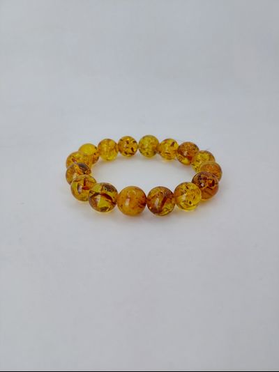 Браслет шары из желтого янтаря