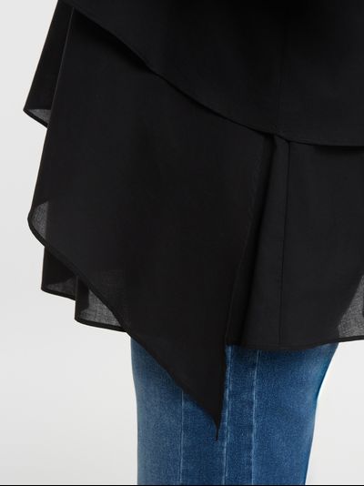 Женская блуза с воланом