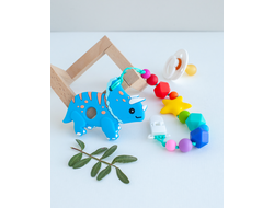 Грызунок из пищевого силикона на держателе Динозавр ТРИЦЕРАТОПС голубой