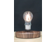 Левитирующая лампочка на деревянной подставке