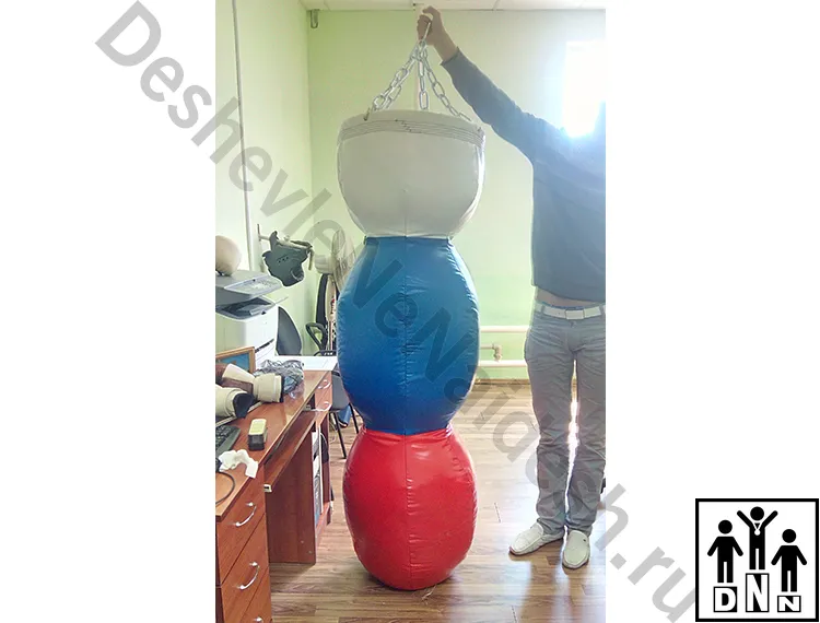 Тpёxceкциoнный боксерский мешок