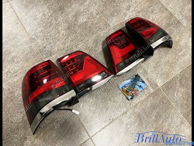Cтопы Toyota Land Cruiser 200 07-15 в стиле 21 года LED (красные с темным низом)