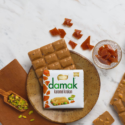 Шоколад Nestle Karamel Krokan с карамелью и фисташками