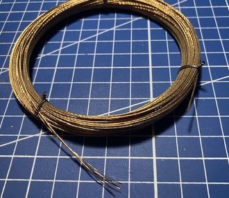0.65 mm  cable with brass coating.