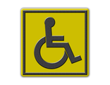 Тактильный знак «Доступность для инвалидов в креслах-колясках» на желтом фоне