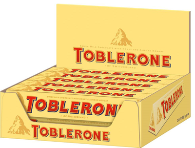 ШОКОЛАД TOBLERONE MILK МОЛОЧНЫЙ С МЕДОВО-МИНДАЛЬНОЙ НУГОЙ