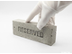 Reserved. Четко, стильно, по-деловому.