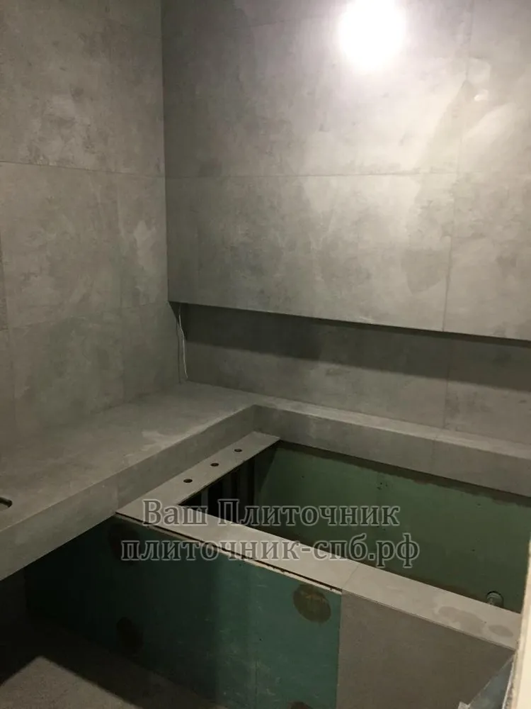 Укладка керамогранита 60*120 см, с заусовкой внешнего угла под 45 градусов. По эскизу заказчика