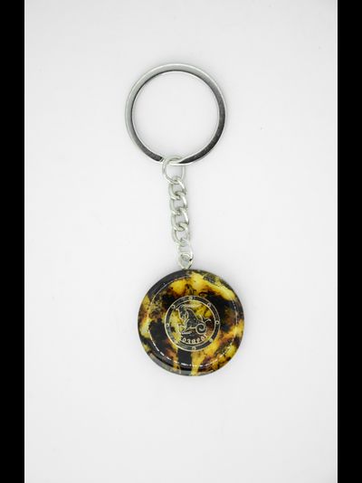 Брелок из натурального янтаря "Козерог"