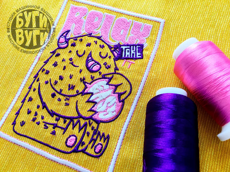 Вышивка на желтой шторе