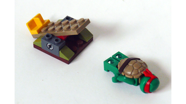 «Черепашья» Катапульта из Набора LEGO # 79103 “Turtle Lair Attack”.