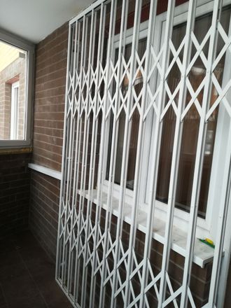 раздвижные решетки на балкон
