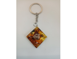 Брелок из натурального янтаря "VOLVO"