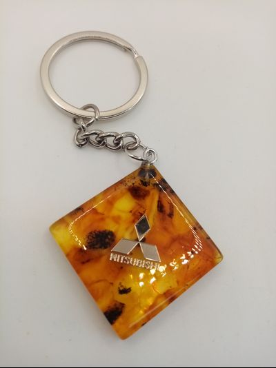 Брелок из натурального янтаря "Mitsubishi"