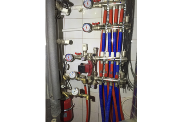 Распределительная гребенка для водяного теплого пола в квартире