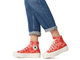 Оранжевые кеды Converse Lift Bright Madder на платформе с темными джинсами фото A02233C