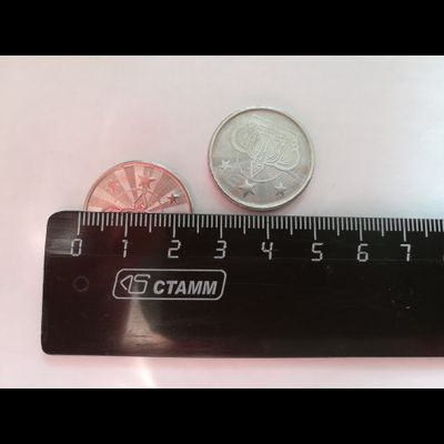 Жетоны для игровых аппаратов 24 мм.