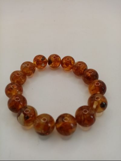 Браслет янтарь долматинец темный