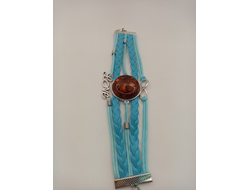 Браслет кожаный с янтарным кабошоном.