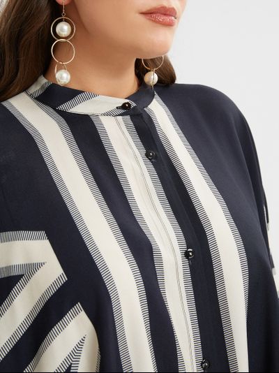 Эффектная легкая летняя блуза с геометрическим принтом