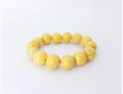 Браслет шары из белого янтаря