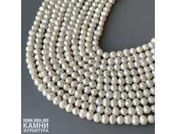 Жемчуг речной белый кругло-овальный фри-форм 5,7-6х6,5-8 мм с щербинками, раковинками, цена за нить 17 см