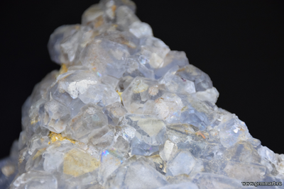 Флюорит- друза фантомных голубых кристаллов с пиритом на породе