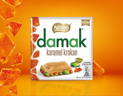 Шоколад Nestle Karamel Krokan с карамелью и фисташками