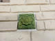Декор-изразец к плитке под кирпич Kamastone Сказка 3081, темно-зеленый с золотом