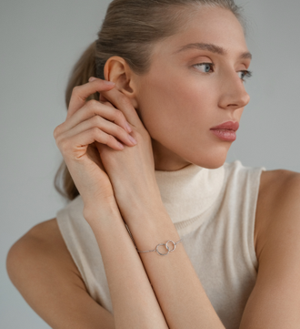 Браслет с подвеской из двух колец и родиевым покрытием НБ 22-354Ю-3