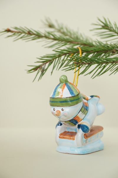 Снеговик на санках (спортсмен)