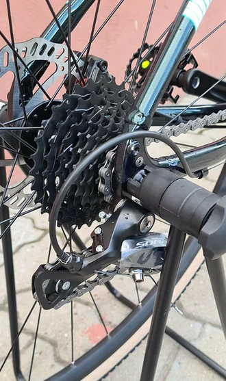 Гравийный велосипед Trinx Climber 2.3 700/540 зеленый белый голубой