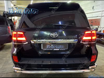 Cтопы Toyota Land Cruiser 200 07-15 LED темные БЕГАЮЩИЕ