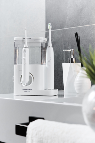 Стационарный ирригатор для полости рта OMIO-100 и звуковая зубная щетка