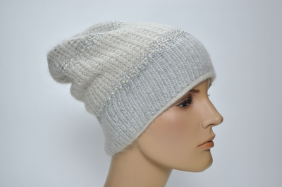 Женская вязаная шапка зима 2025