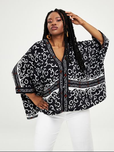 Женская блузка с принтом большого размера в модном бутике XLady