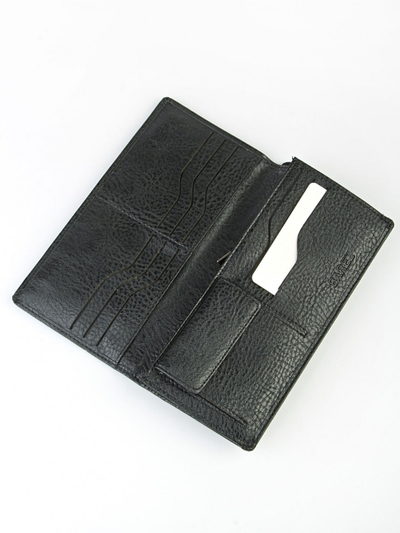 Купюрница мужская. Изделие выполнено из эко-кожи, закрывается на магнит