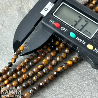 Тигровый глаз, шары в огранке 2,3/3,3/4 мм, цена за нить 39 см