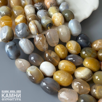 Агат крупная олива 18-23,5 мм с раковинками, трещинками, цена за нить 19 см