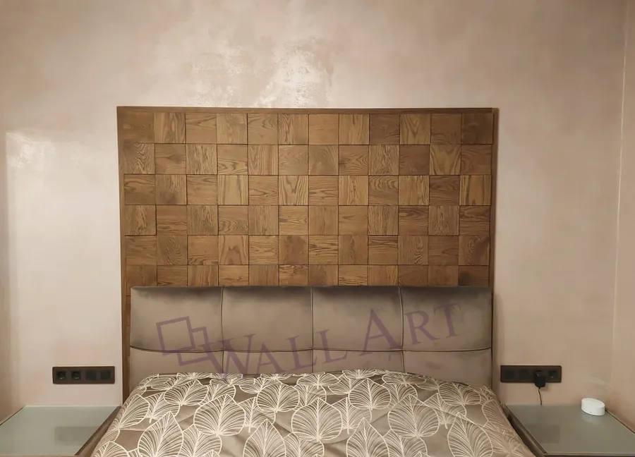 Панели уже на производстве смонтированы на фанерное основание, а некоторые квадратики на каждой панели не приклеены, что необходимо для монтажа. На месте Фанера прикручивается к стене, а квадратики приклеиваются на свои места - все быстро и просто!