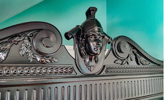 Шкаф для одежды двухдверный с резным фронтоном.