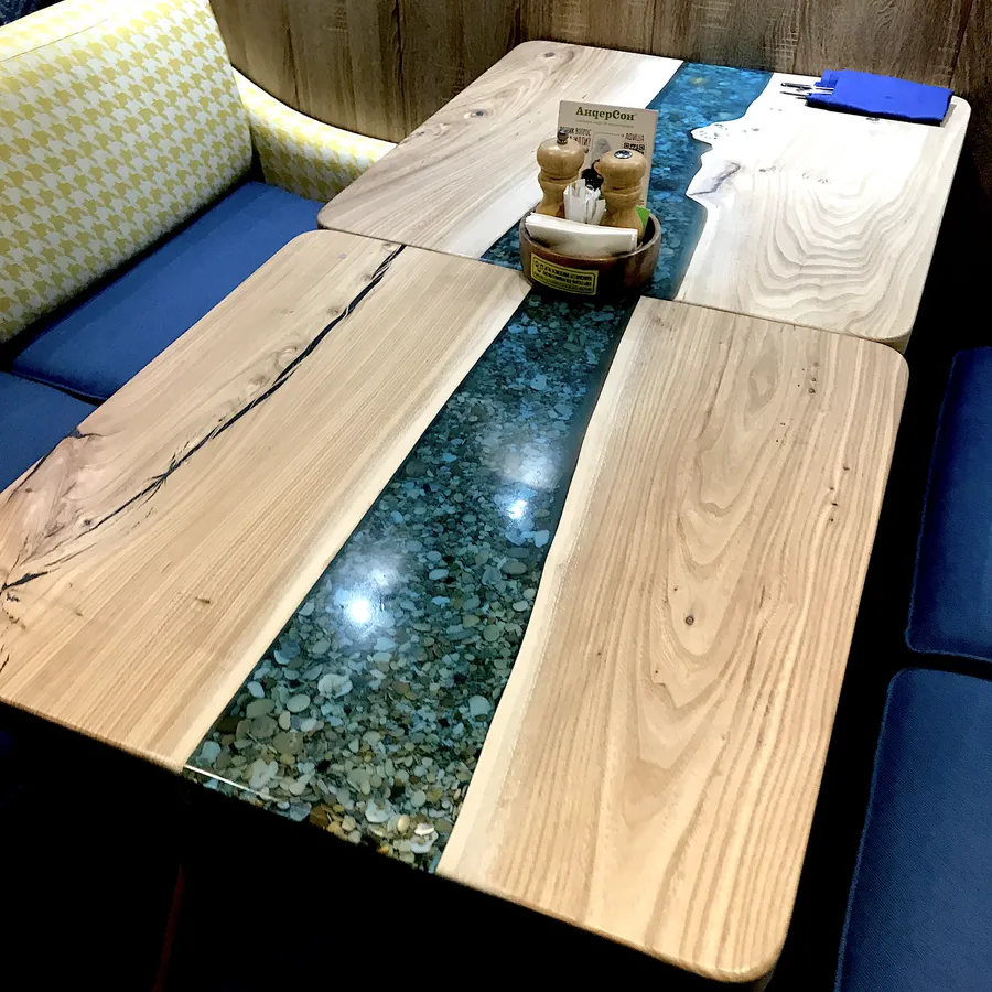 Стол-река из массива карагача для кафе, баров и ресторанов. Работа spilcenter.com для сети семейных кафе "Андерсон", г.Москва