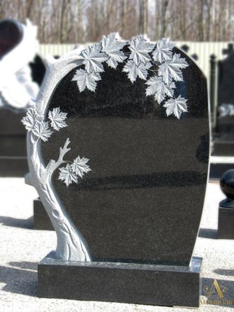 Памятник резной