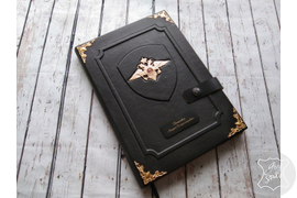 ежедневник формата А4 с гербом МВД и именной надписью.