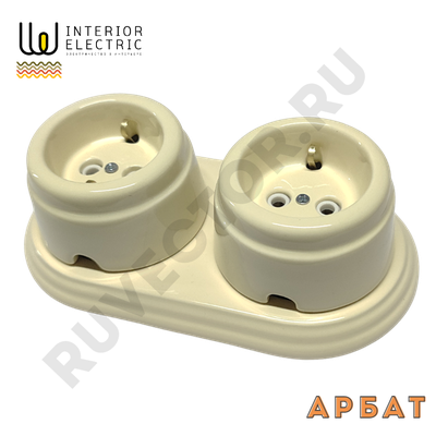 две розетки слоновая кость на керамической подложке