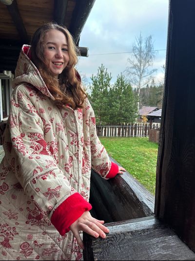 Стеганое пальто "Родное тепло" с капюшоном